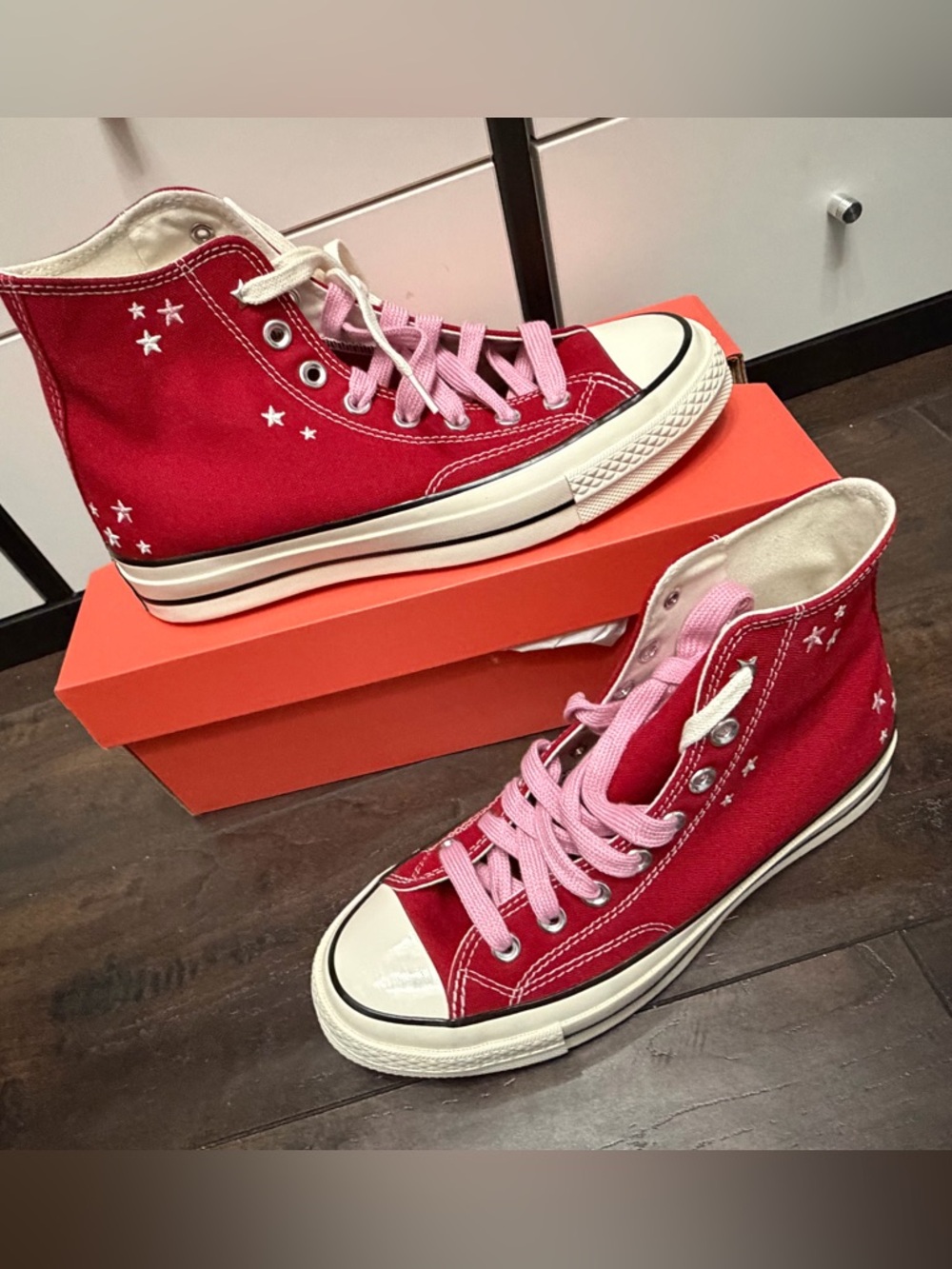 Converse Red High-Top Sneakers with Pink Laces and Star Accents